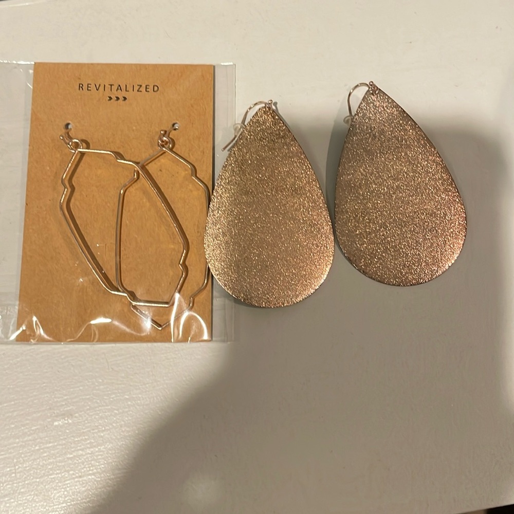 Two sets of earrings.